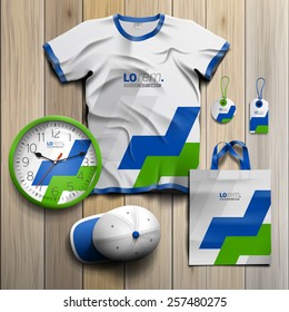White promotional souvenirs design for corporate identity with green and blue geometric elements. Stationery set