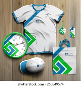 White promotional souvenirs design for corporate identity with blue and green geometric elements. Stationery set