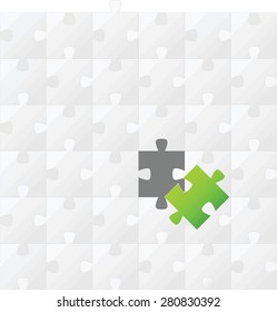 White puzzle background with one green puzzle piece