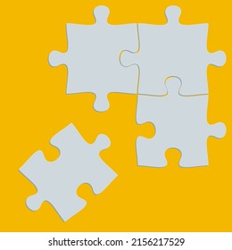 White puzzle pieces on yellow background