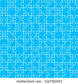 White puzzles pieces on blue pattern