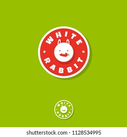 White rabbit logo. Vegetarian icon. Cute rabbit eat carrot. Vegan cafe emblem. Circle logo, on a green background. Flat logo. Monochrome option.