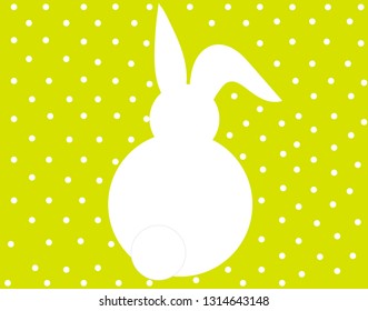 white rabbit on a yellow polka dot background