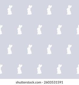 White Rabbit Silhouette Isolated on Soft background. Baby Nappy Print Swatch, Childish Textile Seamless Fabric Pattern Background. Easter mascot Bunny Symbol for Holiday Gift Wrapping Paper Design.