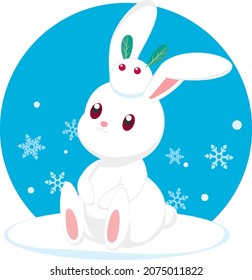 Conejo blanco con conejo de nieve en la cabeza