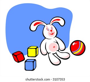 The white rabbit with three multi-colored cubes and a ball.