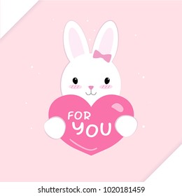 White rabbit which is holding heart for Valentine's day.