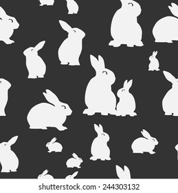 White rabbits on black seamless pattern. vector illustration