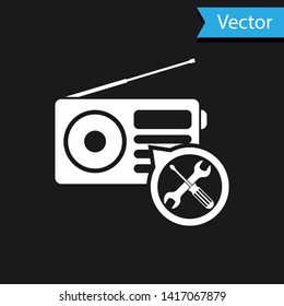 White Radio with screwdriver and wrench icon isolated on black background. Adjusting, service, setting, maintenance, repair, fixing.  Vector Illustration