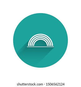 White Rainbow with clouds icon isolated with long shadow. Green circle button. Vector Illustration