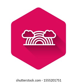 White Rainbow with clouds icon isolated with long shadow. Pink hexagon button. Vector Illustration