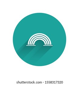 White Rainbow with clouds icon isolated with long shadow. Green circle button. Vector Illustration
