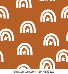 White rainbows patterns on brown background boho style