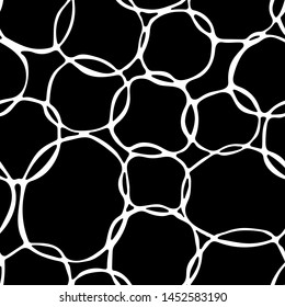 white random doodle circles on black. seamless vector pattern