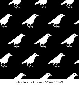 White raven seamless pattern. Crow bird isolated on a black background.