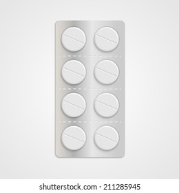 White realistic medical pills in blister pack.