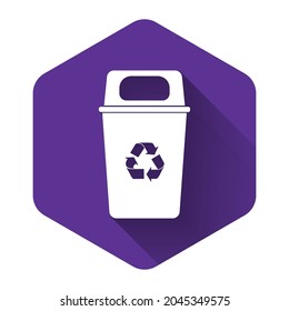 White Recycle bin with recycle symbol icon isolated with long shadow. Trash can icon. Garbage bin sign. Recycle basket sign. Purple hexagon button. Vector Illustration