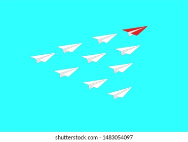 White and red paper plane go in one direction on blue background. Business concept