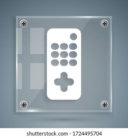 White Remote control icon isolated on grey background. Square glass panels. Vector Illustration