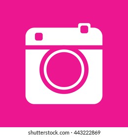 White retro camera icon vector illustration. Pink background