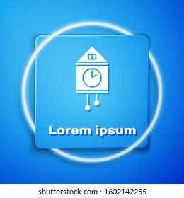 White Retro wall watch icon isolated on blue background. Cuckoo clock sign. Antique pendulum clock. Blue square button. Vector Illustration