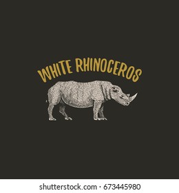 white rhinoceros engraved hand drawn in old sketch style, vintage animals. logo or emblems, retro label and badge.