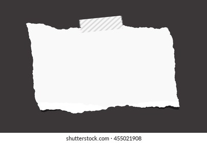 White ripped blank note paper are stuck with sticky tape on black background