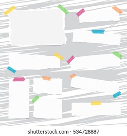 White ripped note, notebook paper sheets stuck with colorful sticky tape on lined pattern