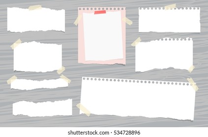 White ripped note, notebook paper sheets stuck with sticky tape on lined pattern