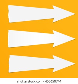 White ripped paper arrows with shadow are on yellow background