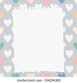 White ripped ruled notebook, copybook, note paper stuck on pattern created of heart shapes