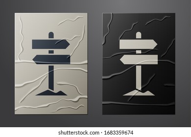 White Road traffic sign. Signpost icon isolated on crumpled paper background. Pointer symbol. Street information sign. Direction sign. Paper art style. Vector Illustration
