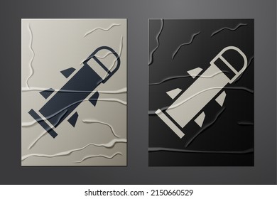 Icono del cohete blanco aislado sobre fondo de papel desmitificado. Estilo de arte de papel. Vector
