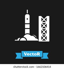 White Rocket launch from the spaceport icon isolated on black background. Launch rocket in space.  Vector Illustration