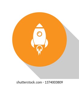 White Rocket ship with fire icon isolated on white background. Space travel. Orange circle button. Flat design. Vector Illustration
