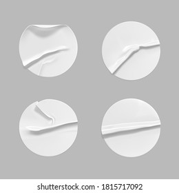 White round crumpled sticker mock up set. Adhesive clear white paper or plastic sticker label with glued, wrinkled effect on gray background. Blank templates label or price tags. 3d realistic vector