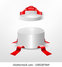 White round giftbox have Red Ribbon and open inside on white background. Realistic 3d.