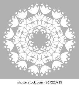 White round ornament on grey background. Ethnic mandala. Floral vector pattern