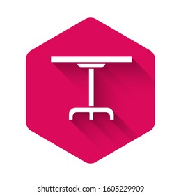 White Round table icon isolated with long shadow. Pink hexagon button. Vector Illustration