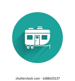White Rv Camping trailer icon isolated with long shadow. Travel mobile home, caravan, home camper for travel. Green circle button. Vector Illustration