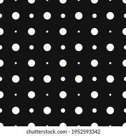 White same dots, but different size. Vector seamless polka dots.