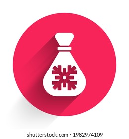 White Santa Claus bag gift icon isolated with long shadow. Christmas presents sack. Merry Christmas and Happy New Year. Red circle button. Vector