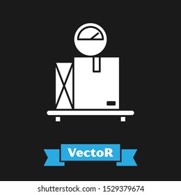 White Scale with cardboard box icon isolated on black background. Logistic and delivery. Weight of delivery package on a scale.  Vector Illustration