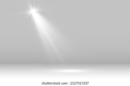 Escena blanca encendida con focos.	