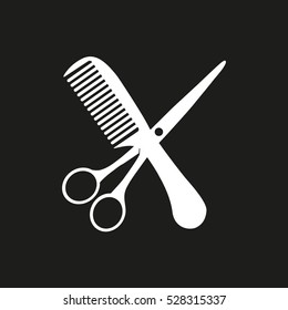 white scissors and comb on white background