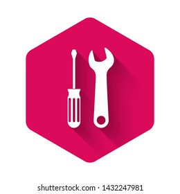 White Screwdriver and wrench tools icon isolated with long shadow. Service tool symbol. Pink hexagon button. Vector Illustration