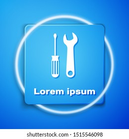 White Screwdriver and wrench tools icon isolated on blue background. Service tool symbol. Blue square button. Vector Illustration