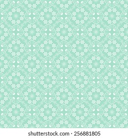 White seamless floral pattern on a green background