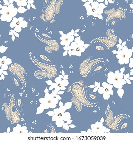 white seamless flowers pattern on paisley pattern on blue background