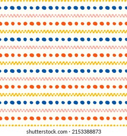 White seamless pattern with colorful dots and spots.